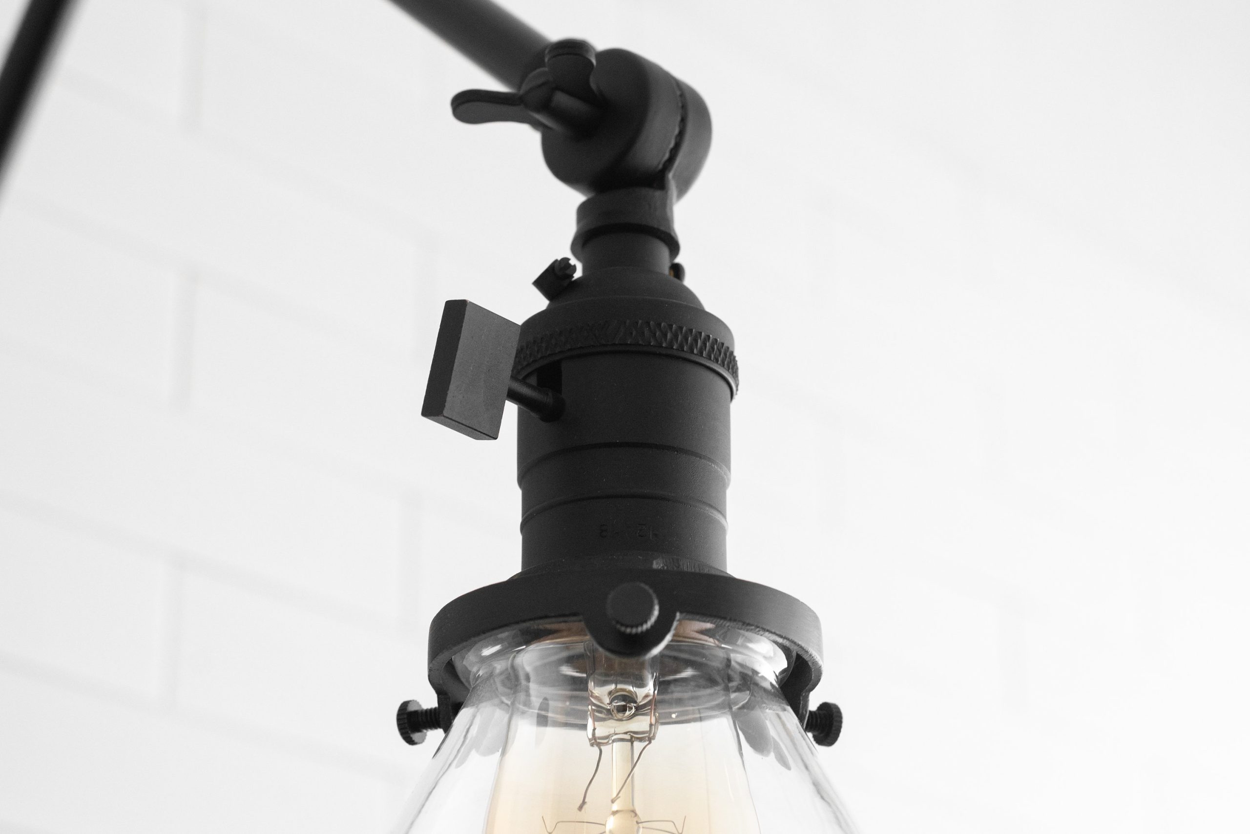 Adjustable-transparent-glass-cone-wall-lamp-4-scaled-1.jpg